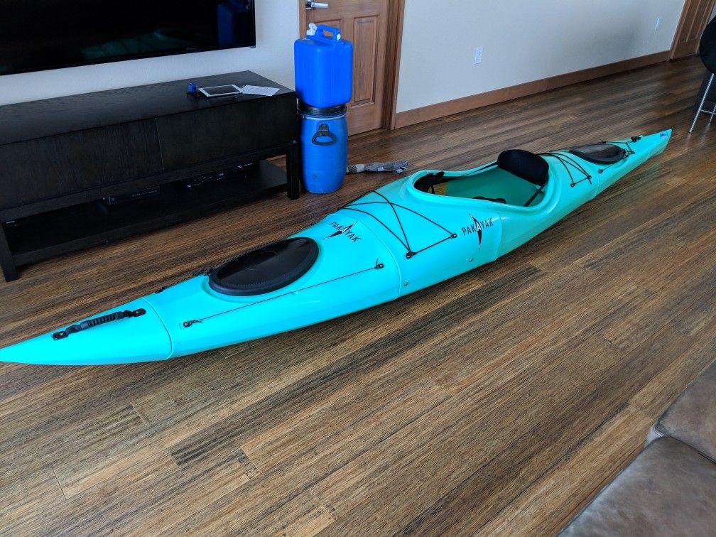 Pakayak Bluefin 14 Ft - hardshell packs down into included rolling bag that fits in the trunk of your car.