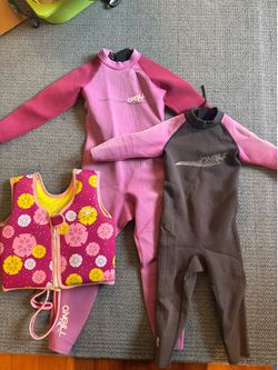 Kids wet suits and life jackets/floaties