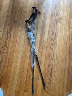 Brand New Trekking Poles / Hiking Sticks (Pair) – Carbon Fiber & Cork Grip Brand new pair of trekking/hiking poles. Never used, partly still in prote