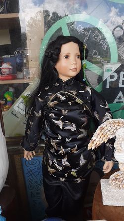 Really nice tall doll and oriental clothing