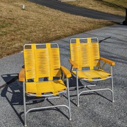 Two Vintage Yellow Aluminum Folding Chairs 