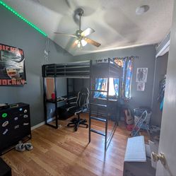 Metal frame bunk bed with desk underneath