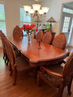 Dining table, 10 chairs and China