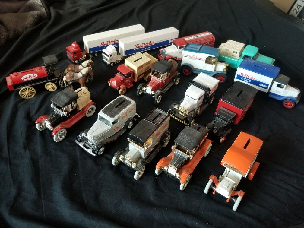 Antique True Value Piggy Bank trucks.