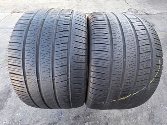 2 USED TIRES PIRELLI 305/35/20
