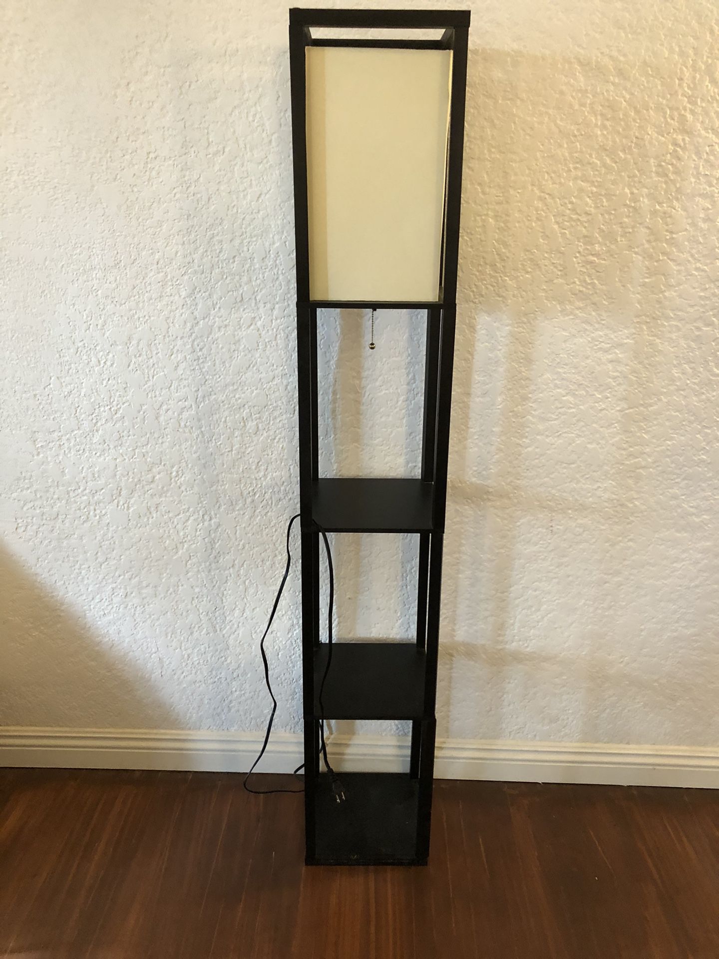 Floor lamp with shelves