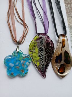 Three new glass pendant necklaces on silk strings
