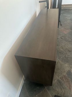 Dark grey TV stand with storage