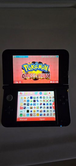 Nintendo 3DS XL  with 128gb memory Teal Console Pokemon Bank Transport Games