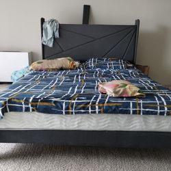 Queen size foam and spring bed with bed frame