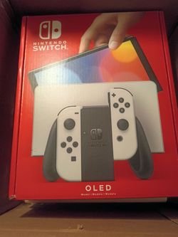 Nintendo Switch OLED UNOPENED/ obo