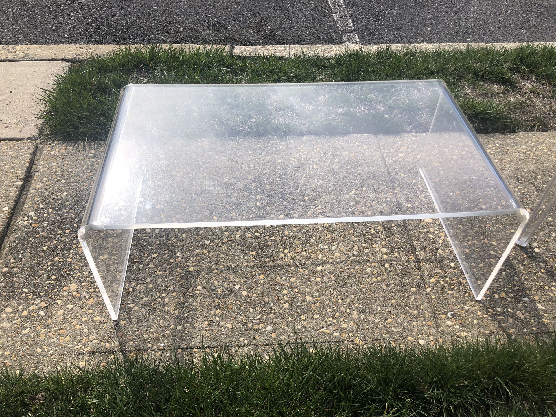Clear acrylic minimalist coffee table