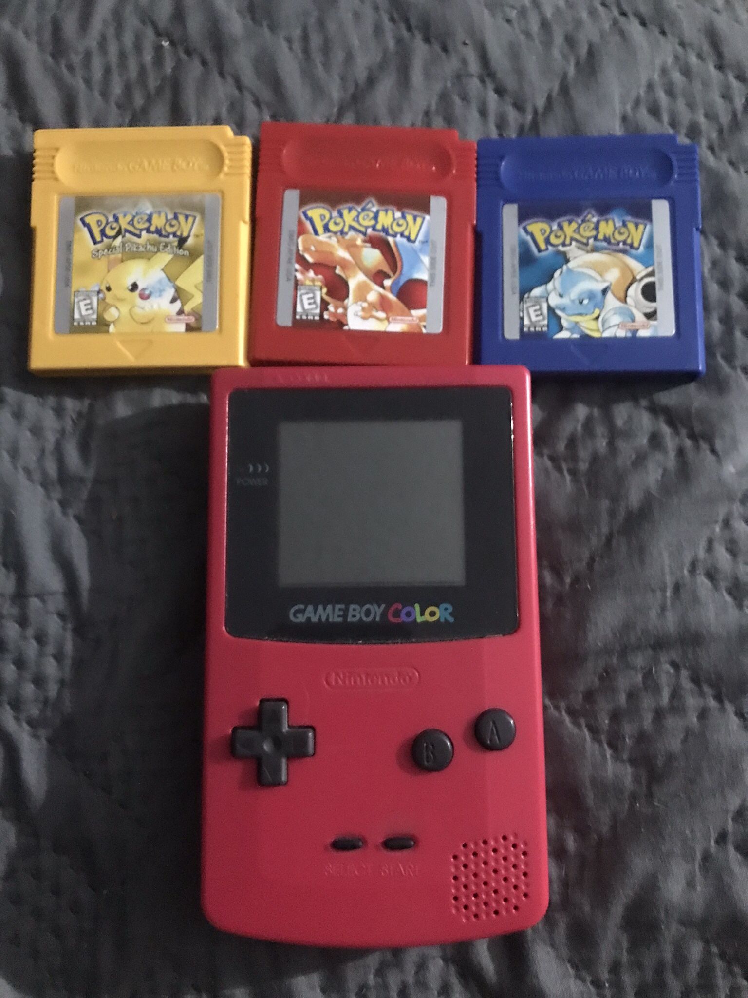 Gameboy Color With Pokémon Red, Blue And Yellow