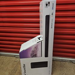 The LG SL4Y is a 2.1-channel, 300W soundbar system with a 6-inch wireless subwoofer,