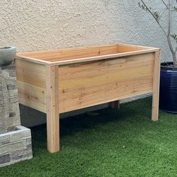 Cedar Planter made by size.