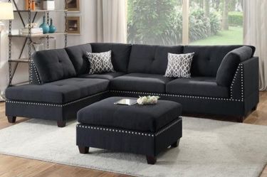 New black sofa sectional with studs