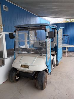 EZ GO GOLF CART W/ ENCLOSURE
