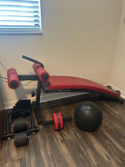 Sit up Bench.  25lb Medicine Ball and 2 Ab Roller