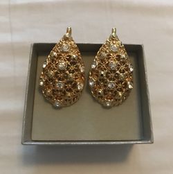 Pair of gold-colored earrings