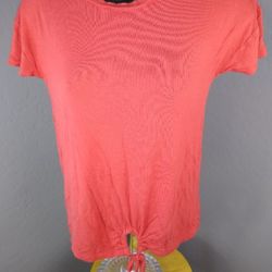 Small orange colored blouse
