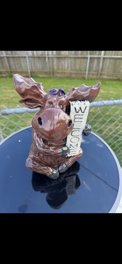 Mr. Moose welcomes you statue