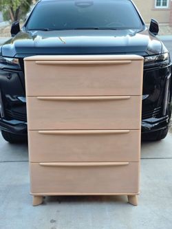Mid Century Modern tall dresser beautifully constructed with solid maple Completely restored.