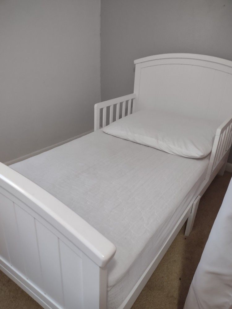 Two Toddler Beds With Mattresses