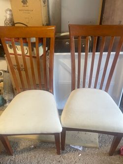 Two wide wooden chairs for $8
