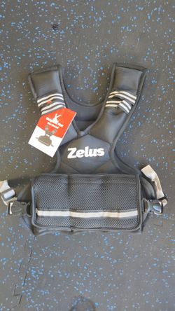 NEW IN BOX ADJUSTABLE WEIGHTED VEST  up to 32lbs