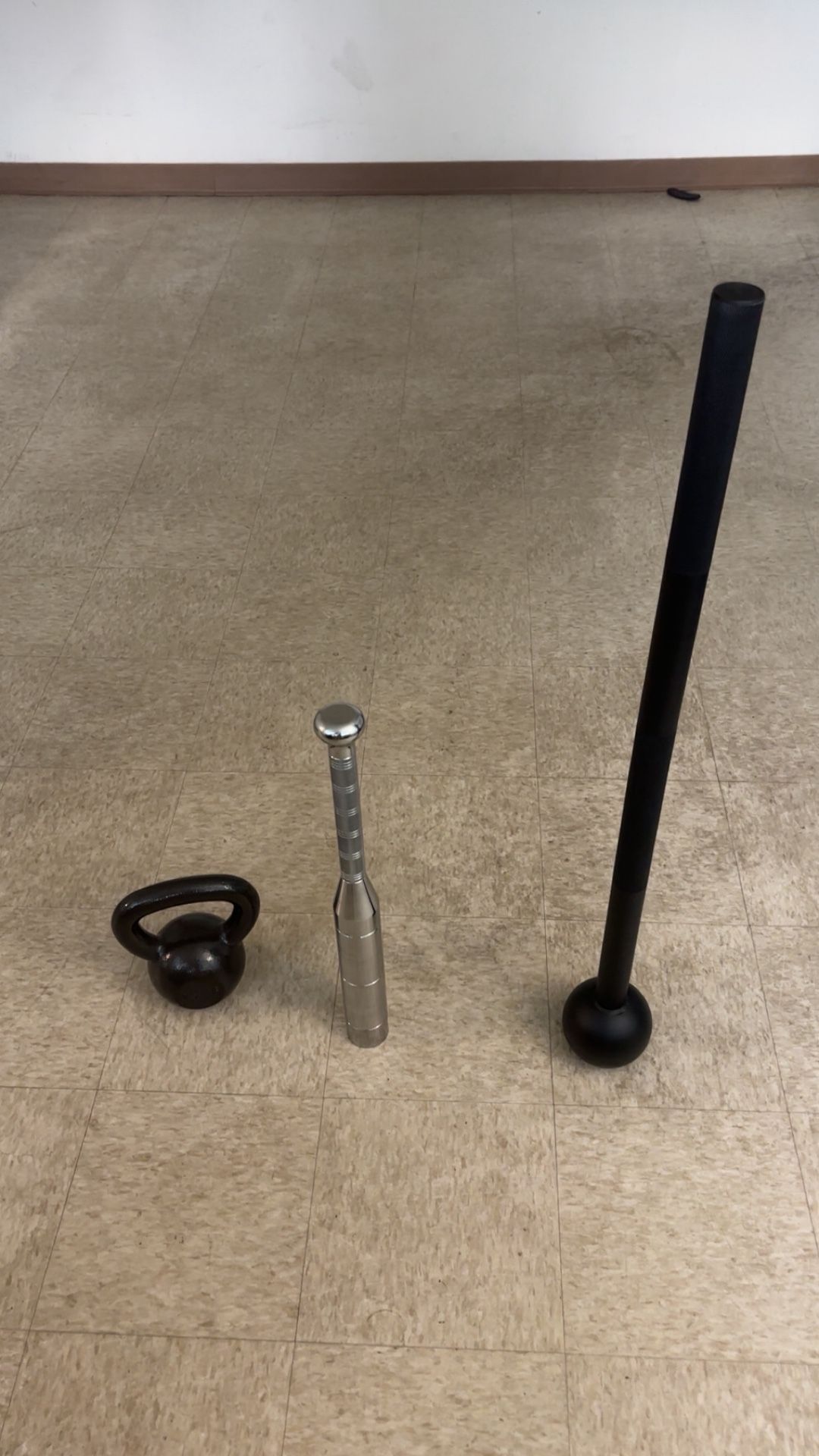 Kettlebell (25 LB), Macebell (20 LB), Clubbell (17.5 LB)