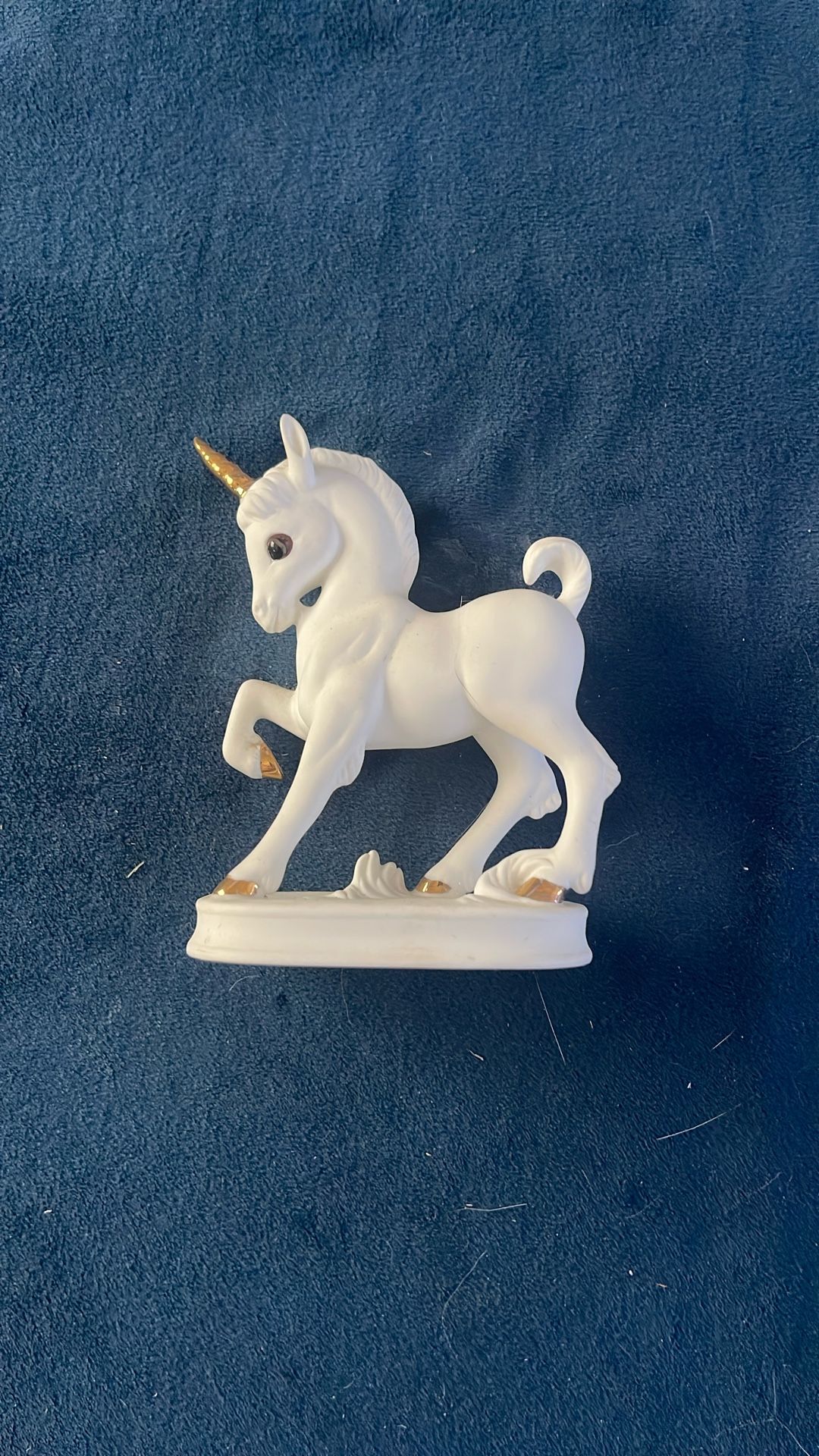 Porcelain Unicorn With gold trim 