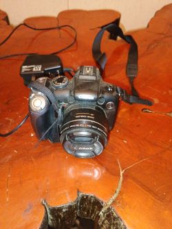 Canon PC1304, mini tripod, 110v adapter $70