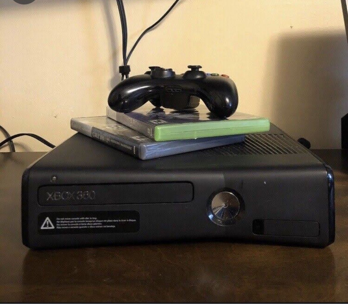 xbox 360 with games and controllers