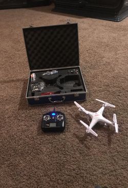 Drone with case and extra batteries and extra parts new