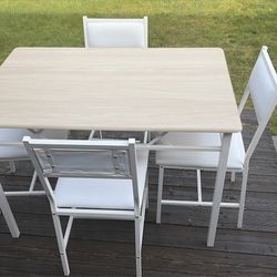 Table and 4 chairs