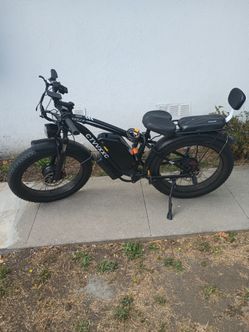 90000 dual motor 45MPH with a 52V 34Ah up to 100 miles in rage