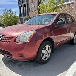 2009 nissan Rougue s 131k miles runs and drives have transmission problems just a put a brand new battery clean Colorado 1200$ firm