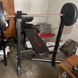 Marcy Club Weight Bench With Some Weights 