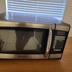 Microwave EMERSON de uso