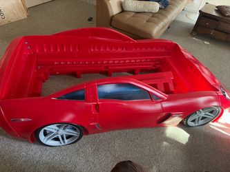 Red car bed (corvette). No mattress.