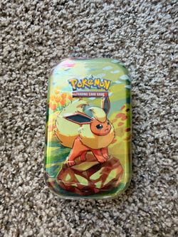 Pokemon Prismatic Tins