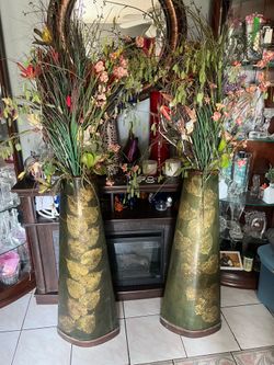 Floor vases with artificial floral arrangement