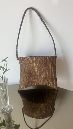 Very Old Vintage Bag In Bark Tree Wood