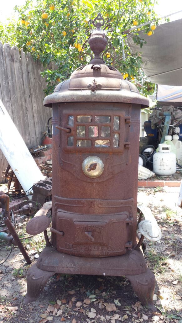 Antique vintage 1900s phoenix The Wehrle Co Newark Ohio nickel and cast iron wood stove
