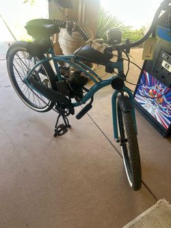 Beach cruiser 25” wheels with gas motor.