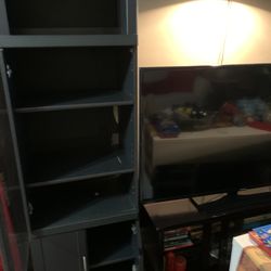 bookshelf black five shelf in each size light in the ceiling