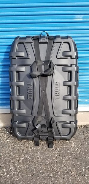 Photo Thule round trip bike travel case. Measures approx: 32 wide x 47 tall x 12 deep.