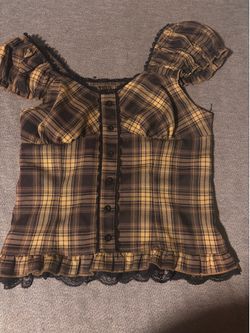 Black and yellow ruffled top