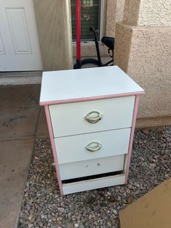 Pink and white dresser