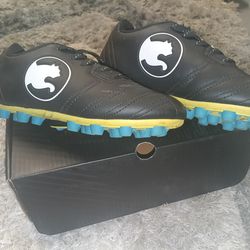 Brand new kids puma cleats size 12